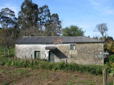 Casa rústica amb jardí en venda a Área Rural