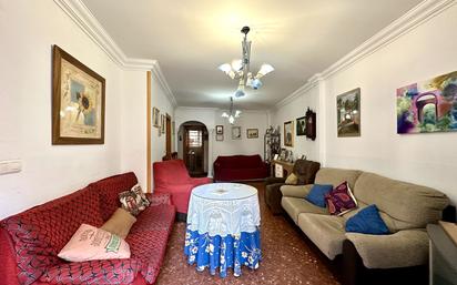 Sala d'estar de Casa adosada en venda en Motril amb Aire condicionat, Terrassa i Traster