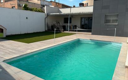 Swimming pool of House or chalet for sale in Albatàrrec  with Air Conditioner, Terrace and Swimming Pool