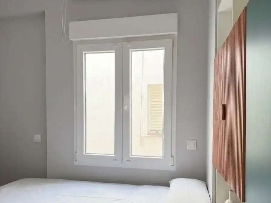 Schlafzimmer von Wohnung zur Miete in  Madrid Capital mit Klimaanlage und Balkon