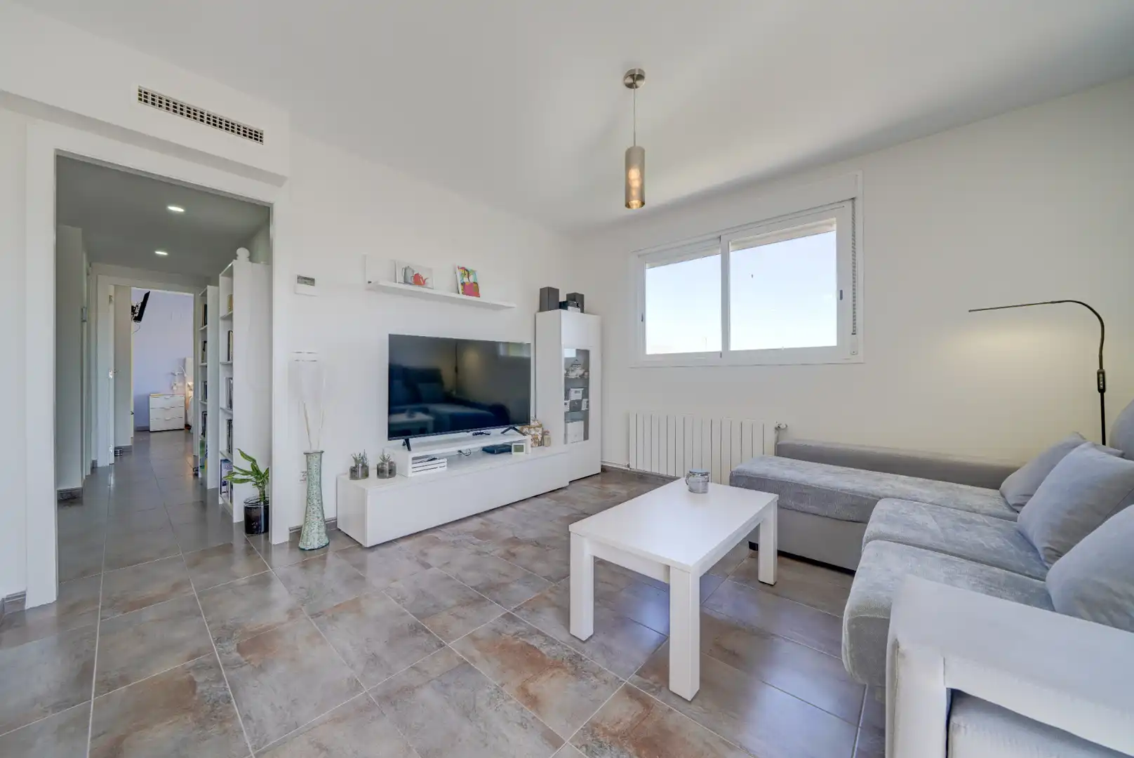 Wohnzimmer von Dachboden zum Verkauf in La Pobla de Farnals mit Klimaanlage, Heizung und Terrasse