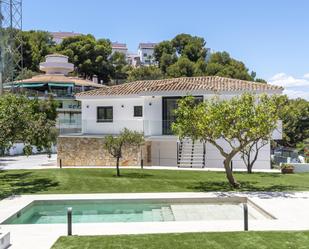 Exterior view of House or chalet for sale in Málaga Capital  with Air Conditioner, Terrace and Swimming Pool