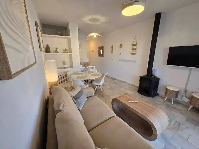 Sala de estar de Casa adosada en venta en Islantilla con Aire acondicionado, Calefacción y Terraza