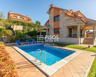 Swimming pool of House or chalet for sale in Sanxenxo  with Private garden