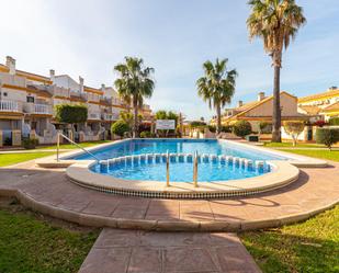 Piscina de Casa adosada en venda en Orihuela amb Aire condicionat, Calefacció i Jardí privat