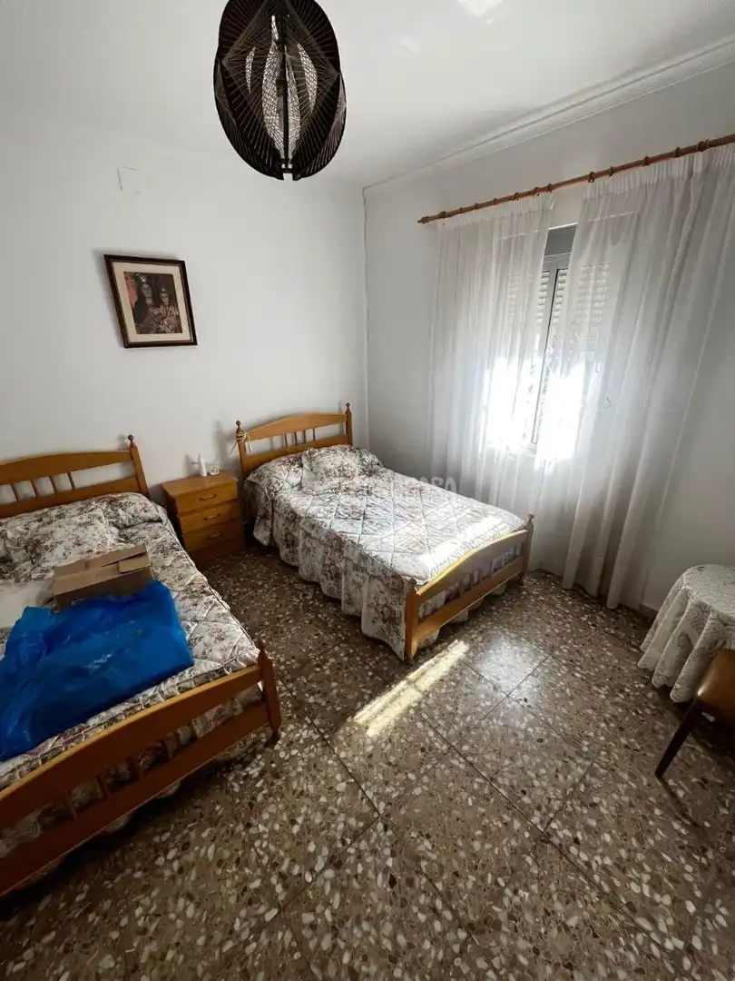 Habitación de Casa adosada en venta en Puertollano con Calefacción