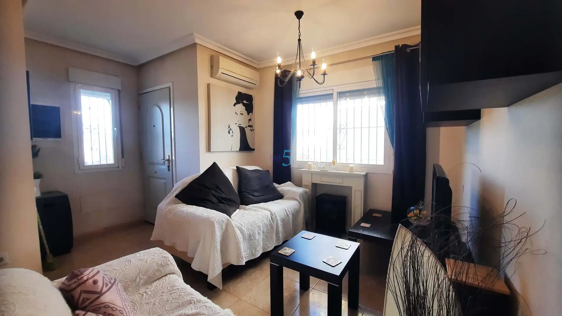 Sala de estar de Casa adosada en venta en Murcia con Aire acondicionado, Piscina y Amueblado
