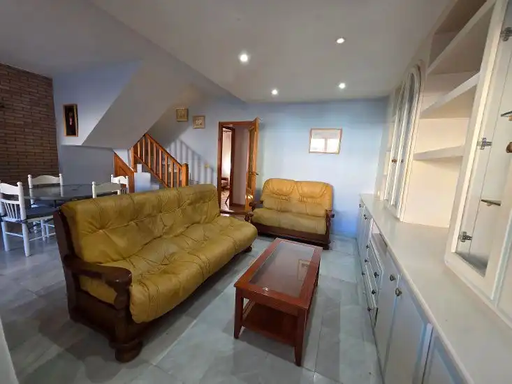 Sala d'estar de Casa adosada en venda en La Manga del Mar Menor amb Aire condicionat, Jardí privat i Terrassa