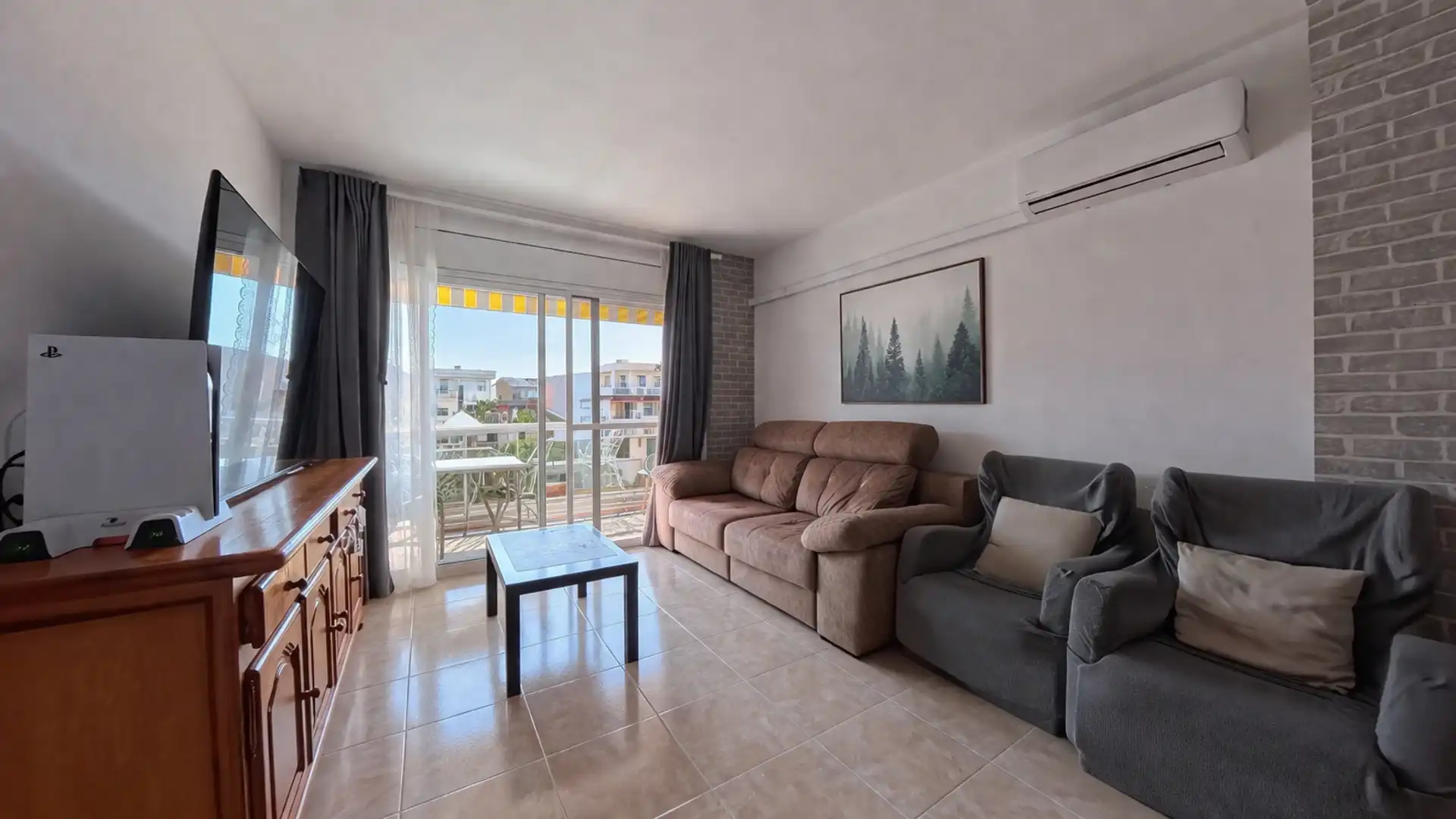 Wohnzimmer von Dachboden zum Verkauf in Cunit mit Klimaanlage, Heizung und Privatgarten