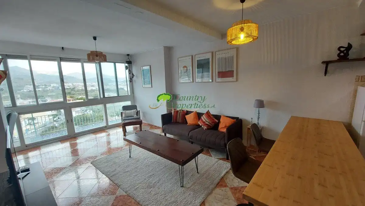 Sala de estar de Apartamento en venta en Almuñécar con Aire acondicionado y Piscina comunitaria