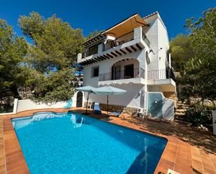 Vista exterior de Casa o xalet en venda en Moraira amb Calefacció, Jardí privat i Terrassa