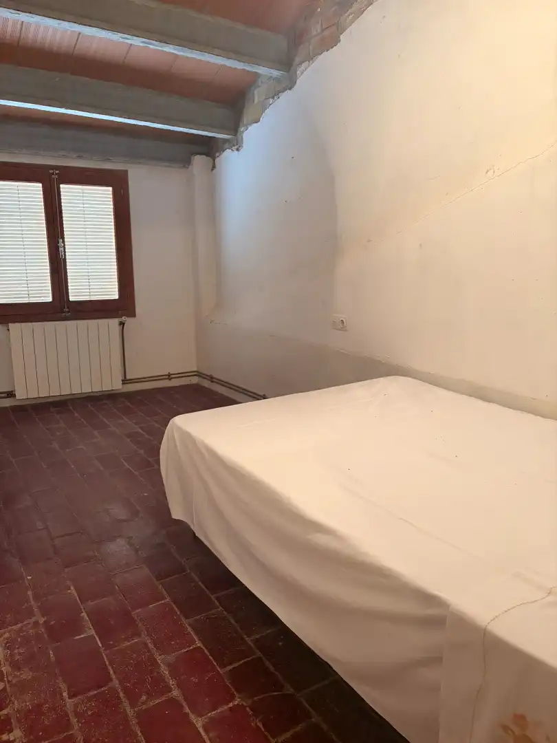 Dormitori de Casa o xalet en venda en Bellvís amb Calefacció, Jardí privat i Moblat