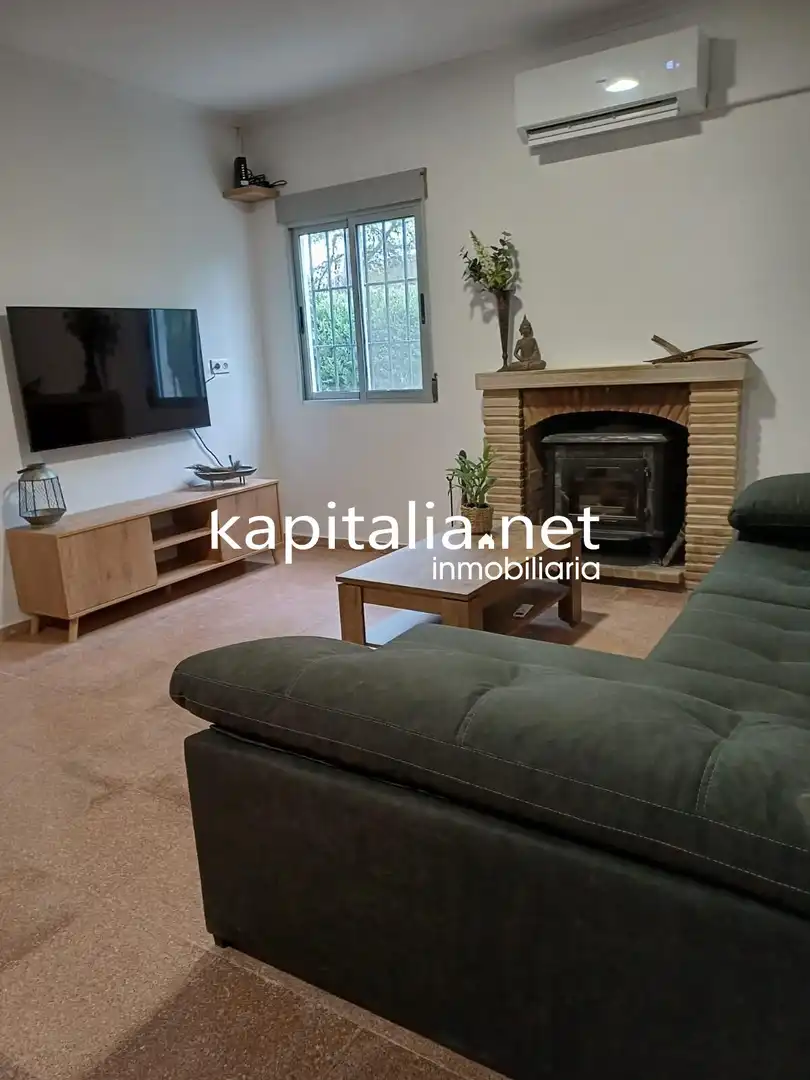 Sala d'estar de Casa o xalet en venda en Albaida amb Aire condicionat, Traster i Piscina