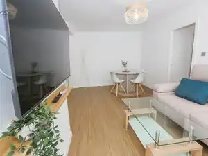 Sala d'estar de Pis de lloguer en Almuñécar amb Aire condicionat, Terrassa i Moblat