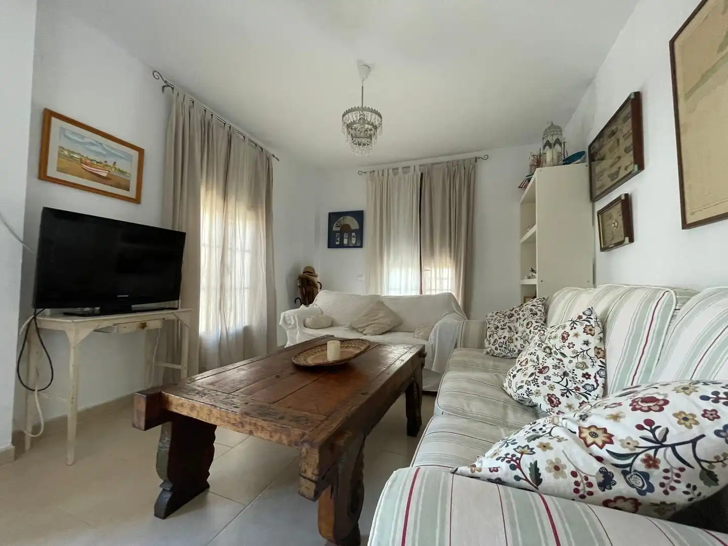 Sala de estar de Apartamento de alquiler en El Rompido con Aire acondicionado, Calefacción y Amueblado