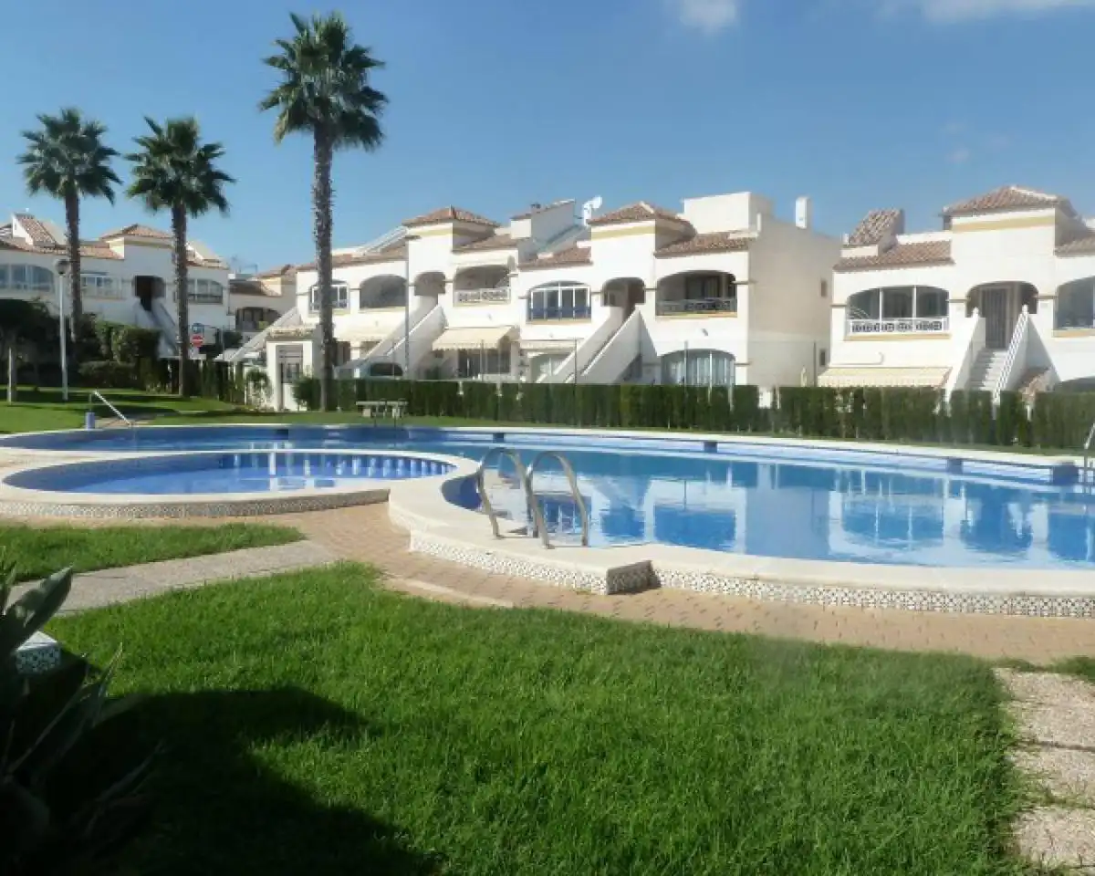 Jardín de Casa adosada en venta en Santa Pola con Terraza, Piscina y Piscina comunitaria