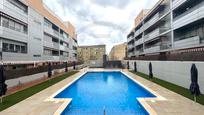 Swimming pool of Planta baja for sale in Terrassa  with Air Conditioner, Heating and Parquet flooring