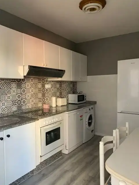 Kitchen of Flat for rent in Ferrol  with Heating, Parquet flooring and Terrace