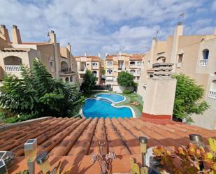 Exterior view of Single-family semi-detached for sale in Torrevieja  with Air Conditioner, Terrace and Balcony