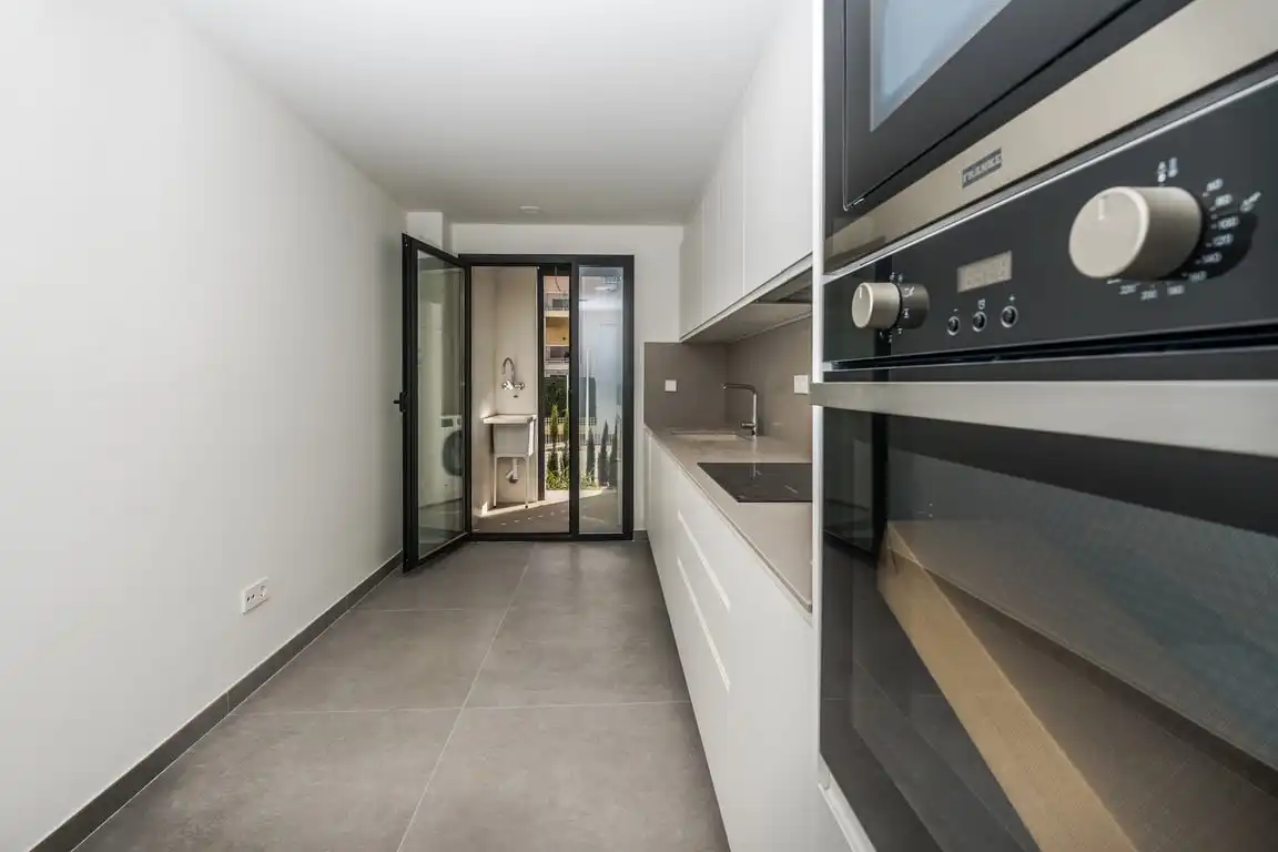 Kitchen of Flat for sale in Jávea / Xàbia  with Air Conditioner, Private garden and Storage room