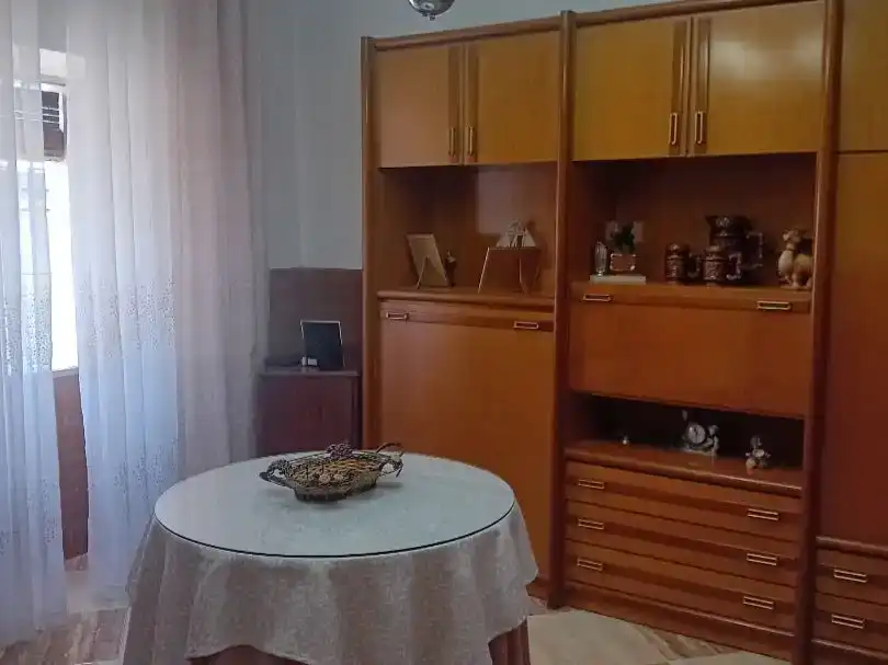Sala d'estar de Casa adosada en venda en Martos amb Jardí privat, Traster i Piscina