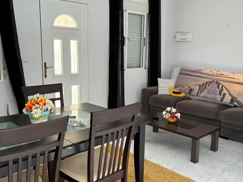 Sala d'estar de Casa o xalet en venda en Rojales amb Jardí privat, Terrassa i Moblat