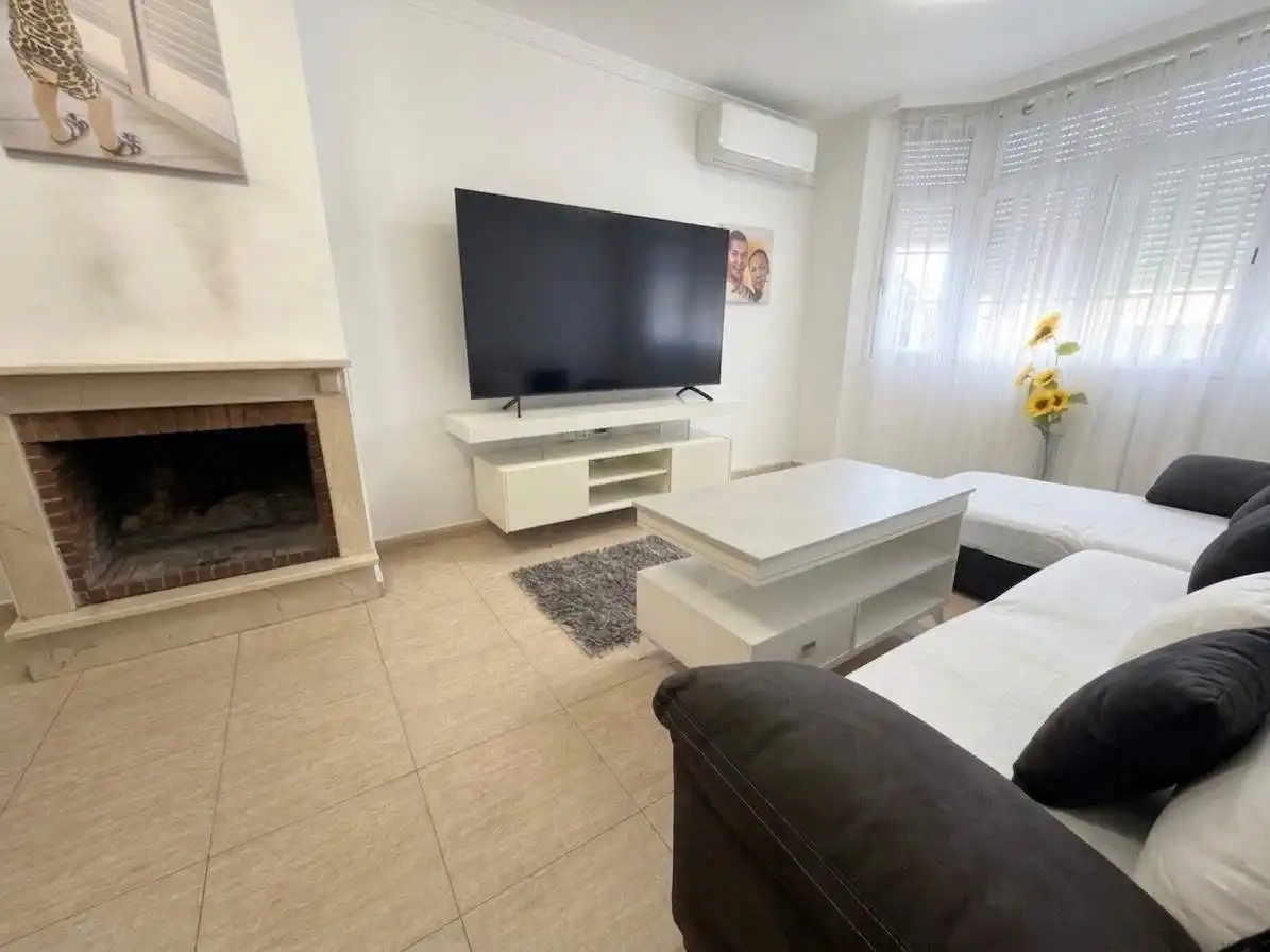 Sala d'estar de Casa adosada en venda en Vélez-Málaga