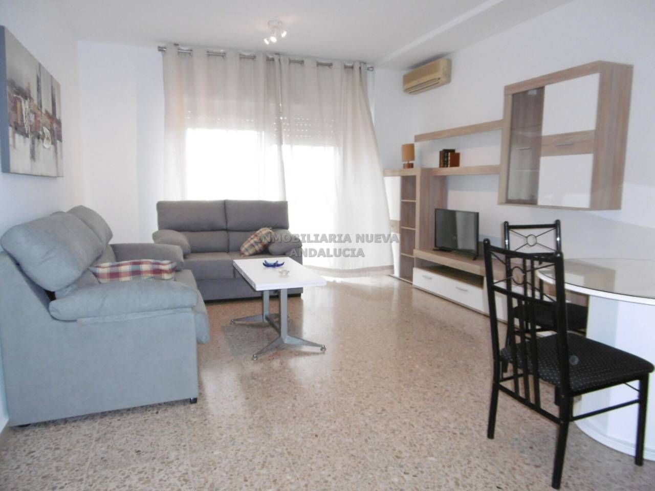 Sala d'estar de Pis de lloguer en  Almería Capital amb Aire condicionat, Terrassa i Moblat