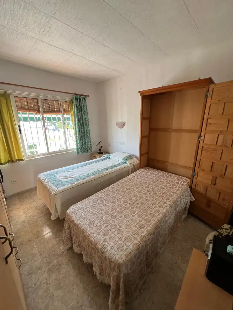 Schlafzimmer von Wohnung zum Verkauf in Benalmádena mit Klimaanlage, Privatgarten und Terrasse