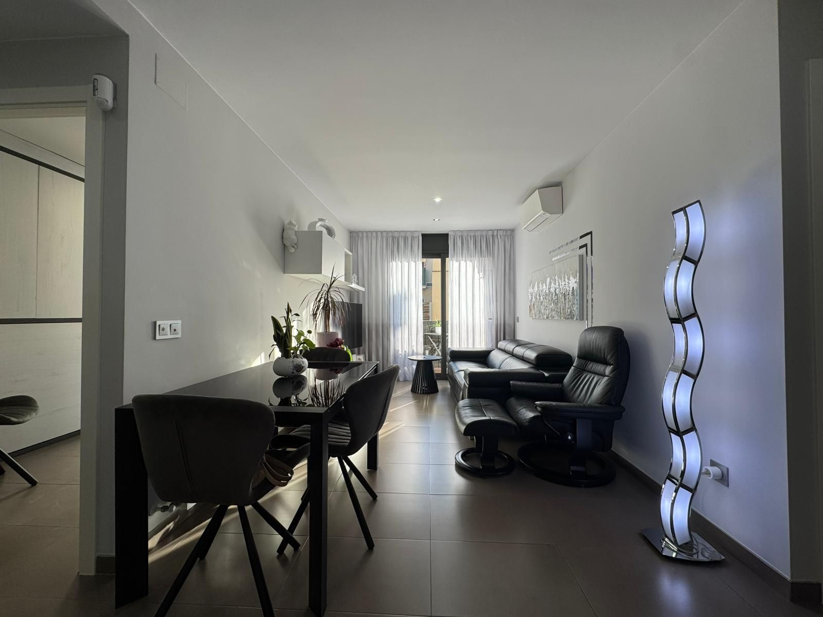 Sala de estar de Piso en venta en Sarrià de Ter con Aire acondicionado, Calefacción y Terraza