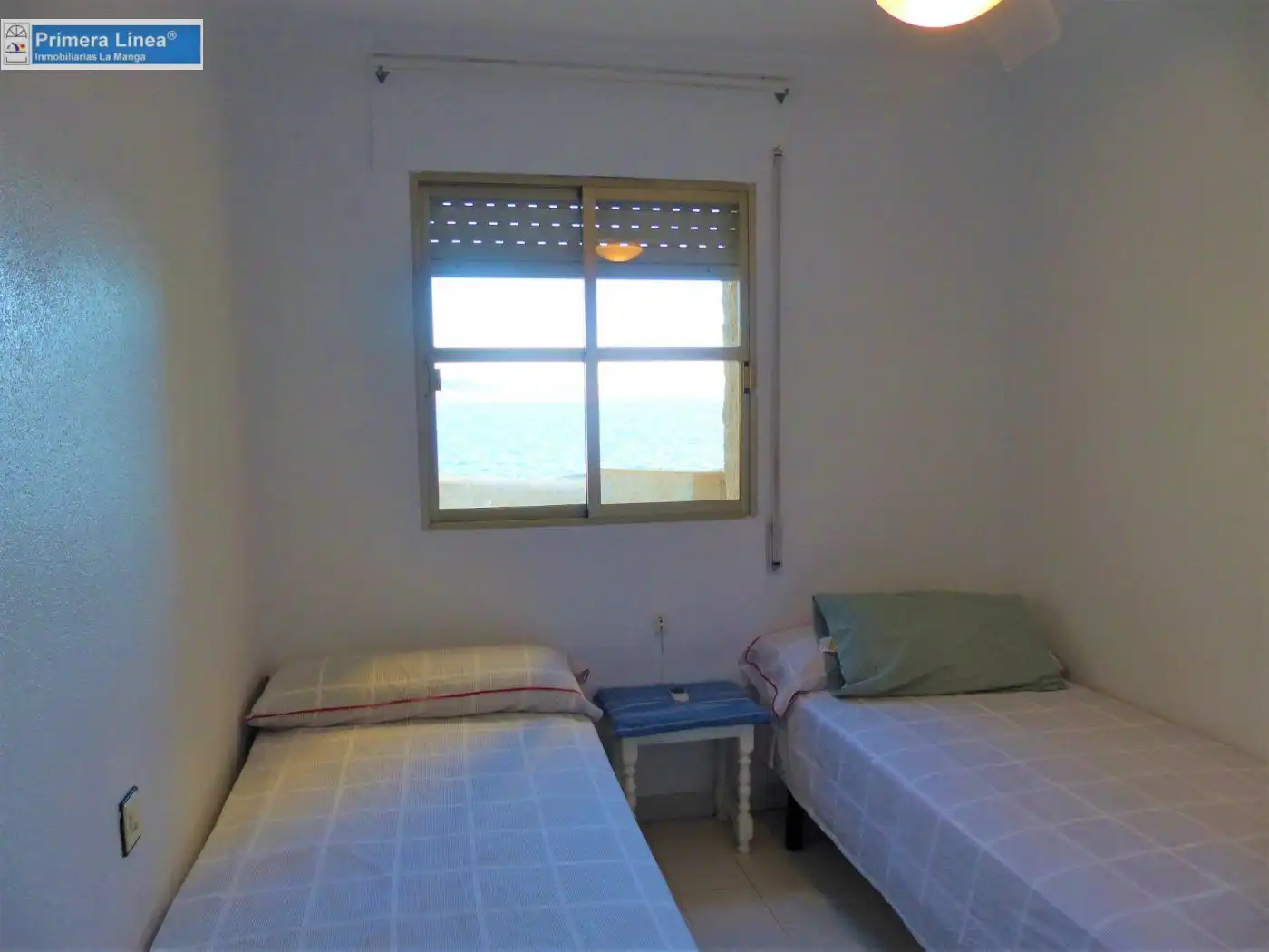 Habitación de Casa adosada en venta en La Manga del Mar Menor con Aire acondicionado, Terraza y Amueblado