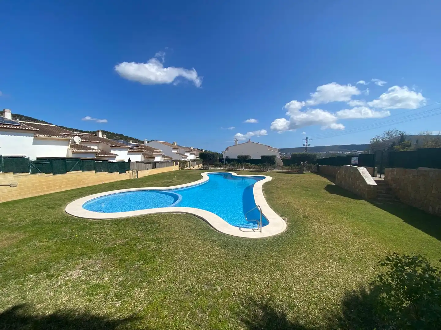 Piscina de Casa adosada en venda en Benitachell / El Poble Nou de Benitatxell amb Calefacció, Jardí privat i Terrassa