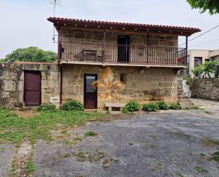 Vista exterior de Casa adosada en venda en Maside amb Jardí privat, Terrassa i Traster