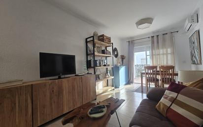 Sala d'estar de Apartament en venda en Punta Umbría amb Aire condicionat, Calefacció i Jardí privat