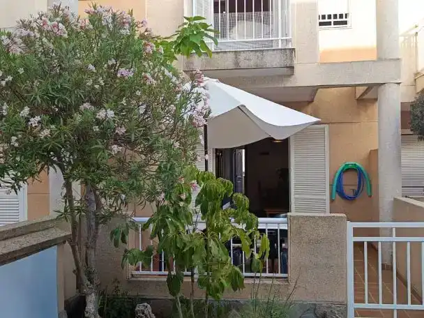 Terraza de Dúplex de alquiler en Garrucha con Aire acondicionado, Piscina y Amueblado