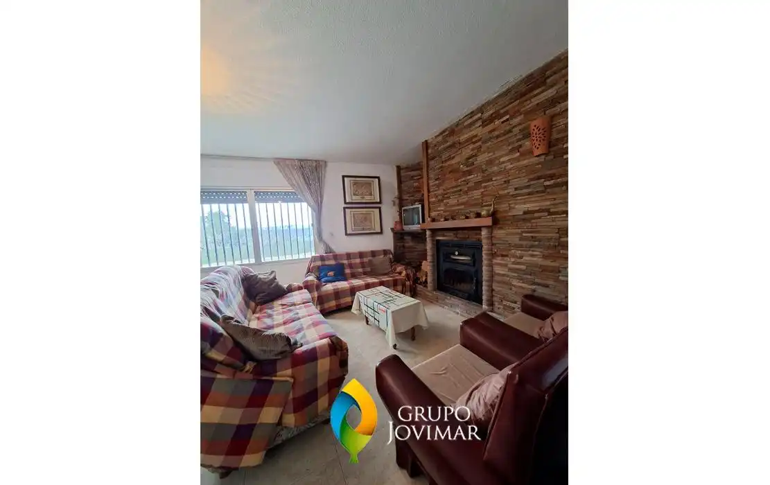 Sala de estar de Casa o chalet en venta en Purullena con Jardín privado, Terraza y Amueblado