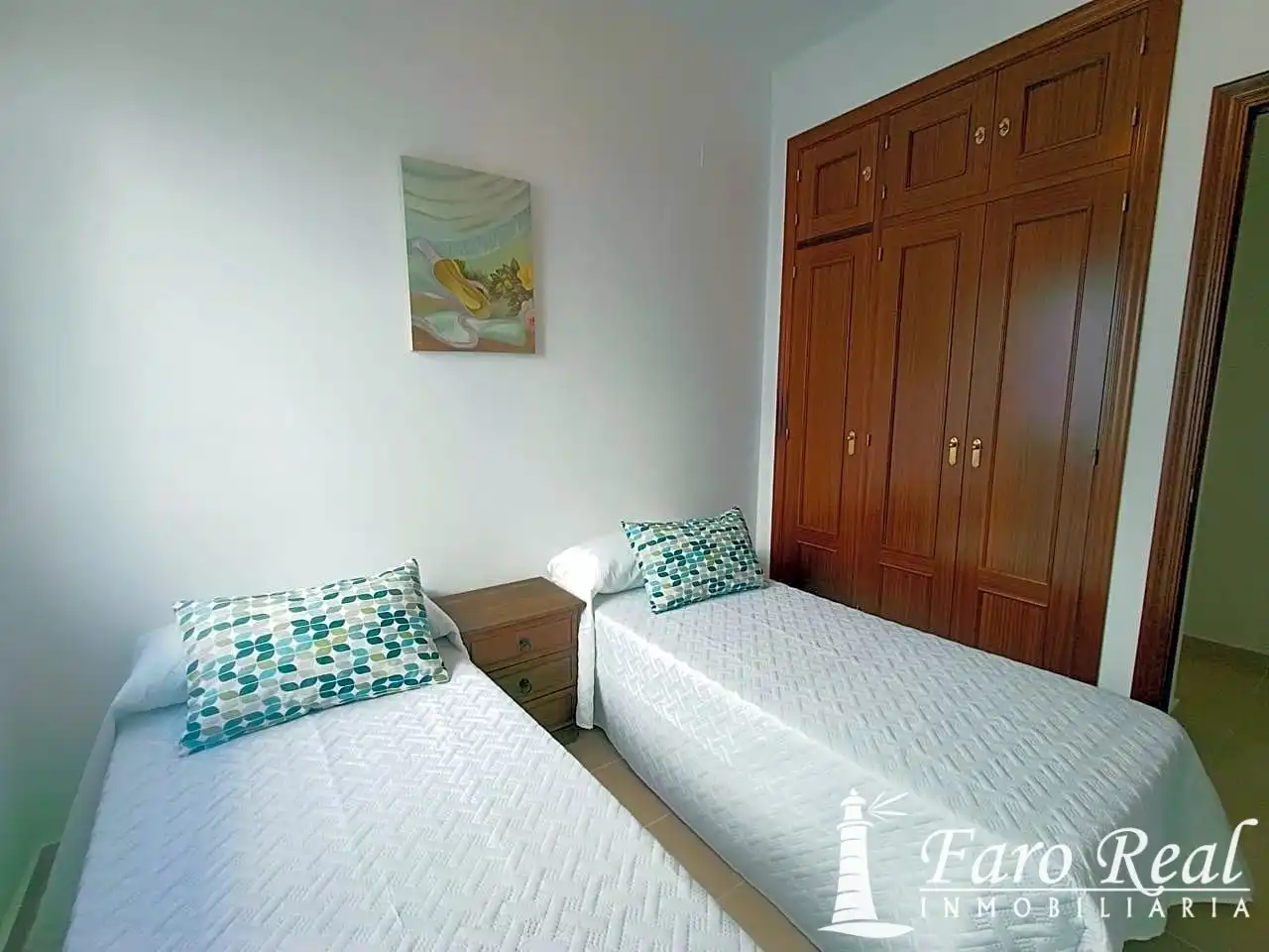 Dormitori de Apartament de lloguer en Sanlúcar de Barrameda amb Aire condicionat i Moblat