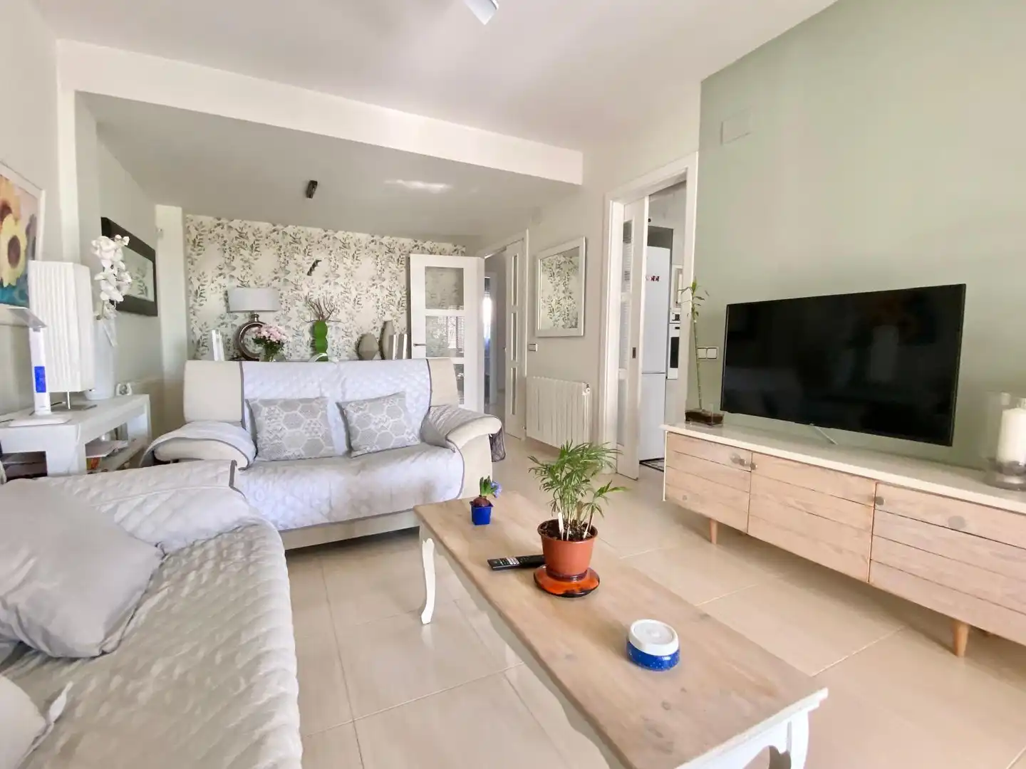 Wohnzimmer von Einfamilien-Reihenhaus zum Verkauf in El Vendrell mit Klimaanlage, Heizung und Terrasse