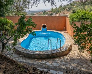 Piscina de Casa adosada en venda en Miraflores de la Sierra amb Terrassa, Piscina i Balcó