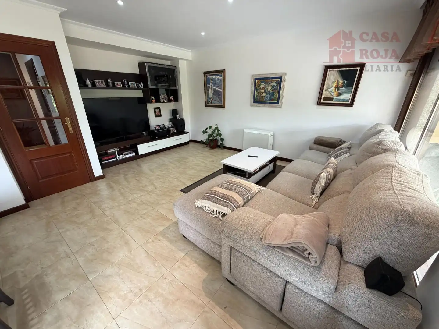 Sala d'estar de Casa adosada en venda en Cangas  amb Calefacció, Parquet i Traster