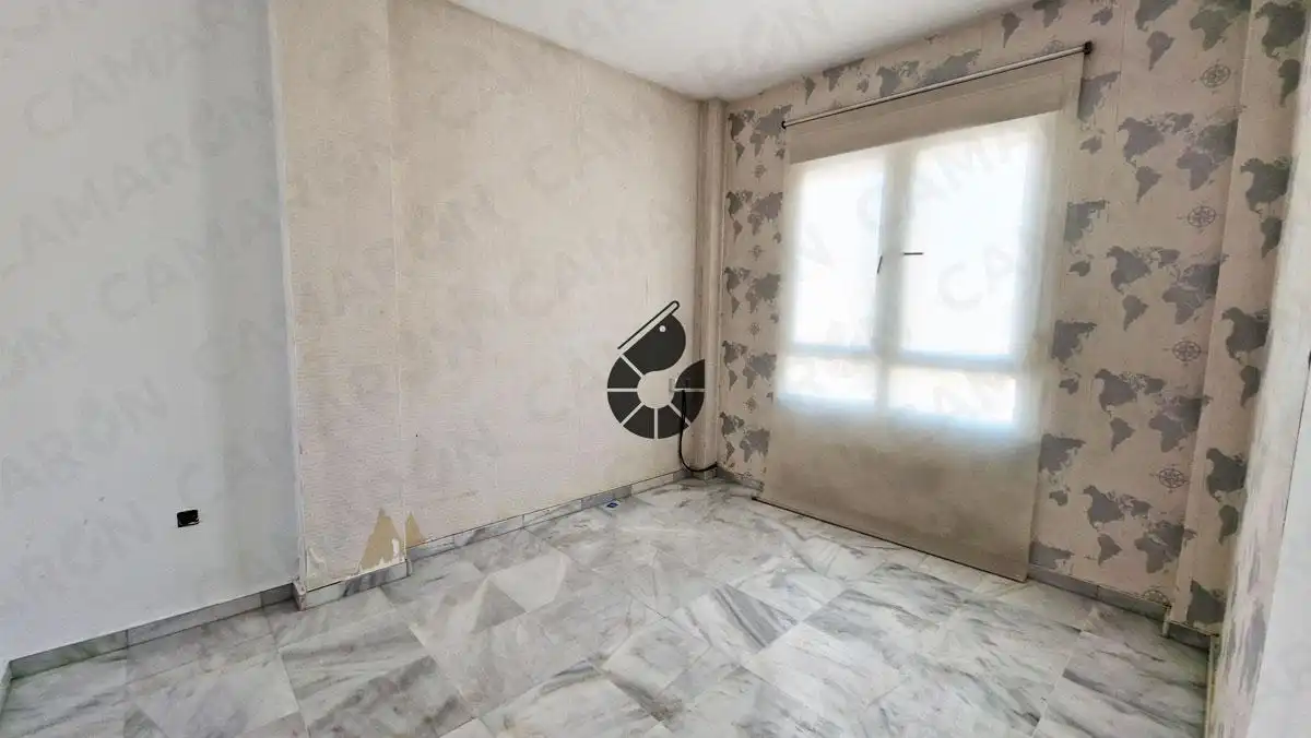 Dormitori de Casa adosada en venda en Coria del Río amb Jardí privat, Terrassa i Alarma