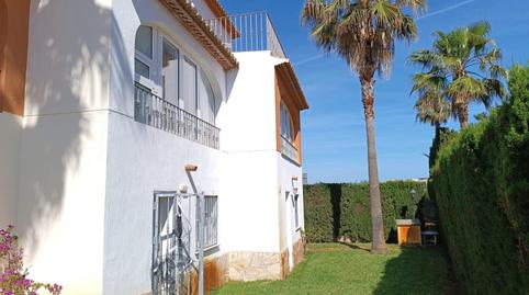 Foto 3 de Casa adosada en venta en Oliva Nova, Oliva