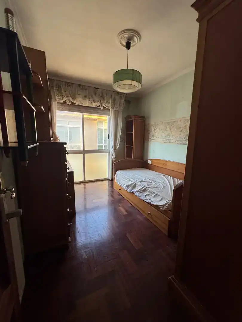 Schlafzimmer von Wohnung zum Verkauf in Teo mit Klimaanlage, Schwimmbad und Balkon