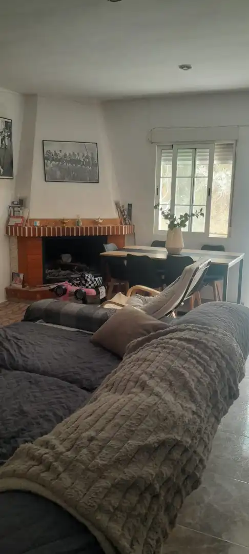 Sala d'estar de Casa adosada en venda en Urrácal amb Moblat