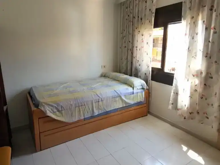 Dormitori de Casa adosada en venda en Benidorm amb Aire condicionat i Piscina