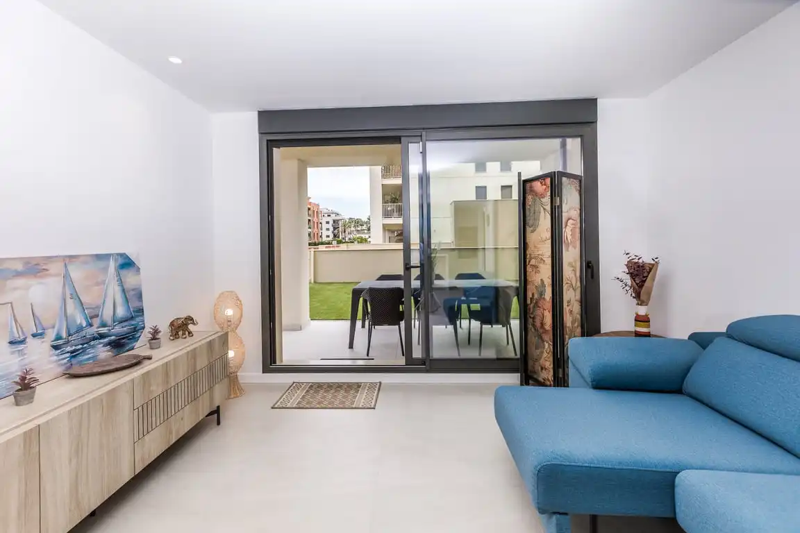 Sala de estar de Apartamento de alquiler en Dénia con Aire acondicionado, Jardín privado y Terraza