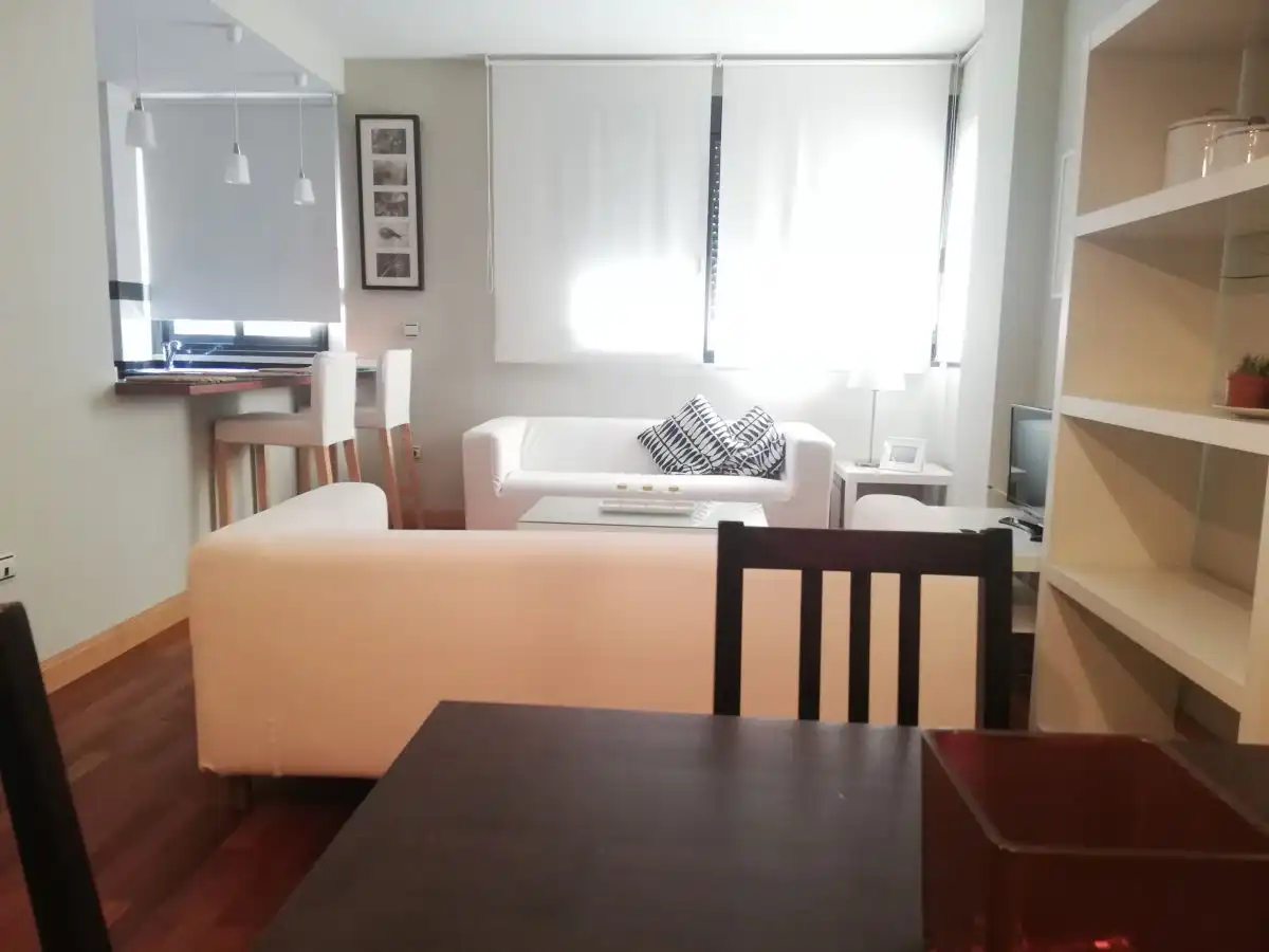 Sala d'estar de Pis de lloguer en Huelva amb Aire condicionat, Moblat i Piscina comunitària