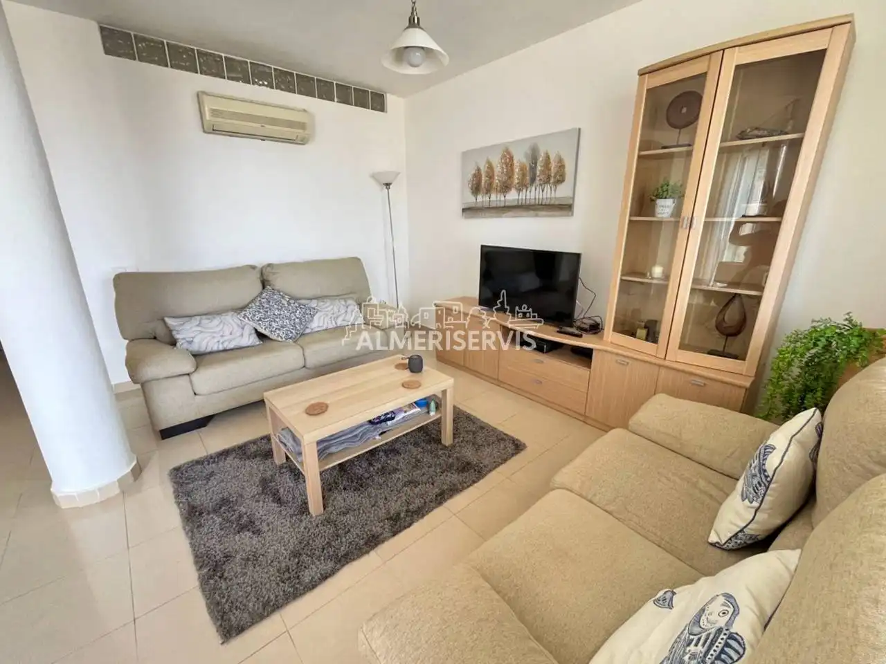 Sala de estar de Casa adosada en venta en El Ejido con Aire acondicionado, Terraza y Amueblado