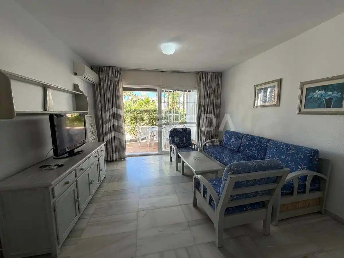 Sala de estar de Apartamento en venta en Roquetas de Mar con Aire acondicionado, Jardín privado y Terraza