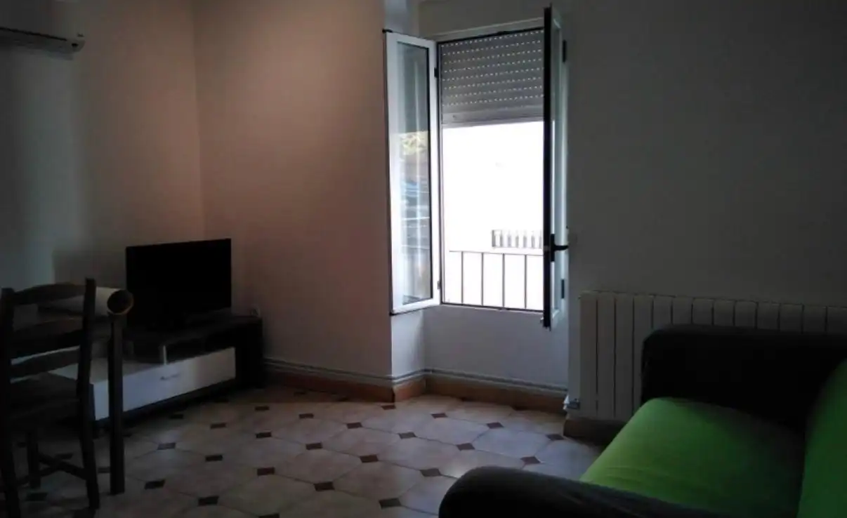 Sala de estar de Piso en venta en Cáceres con Calefacción, Trastero y Amueblado